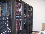 Multiple racks of servers, and how a datacenter commonly looks.